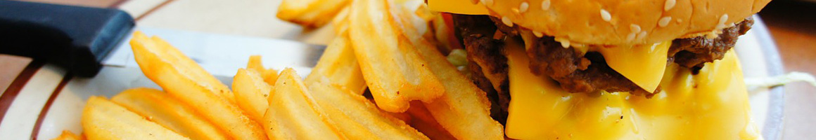 Eating American (Traditional) Burger Fast Food at Hinkle's Hamburgers restaurant in Bloomington, IN.